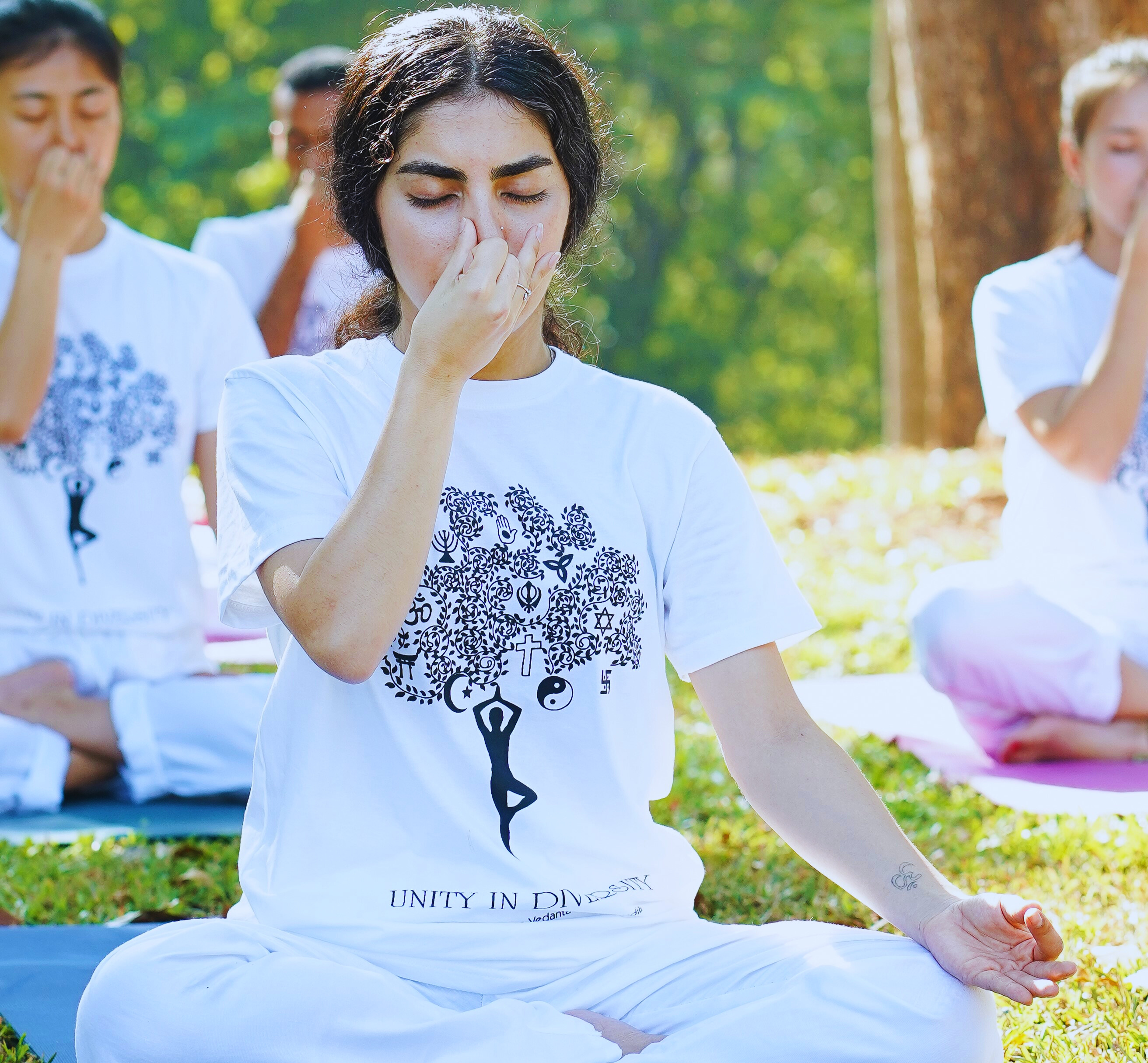 yoga-a lady practicing pranayama with a group