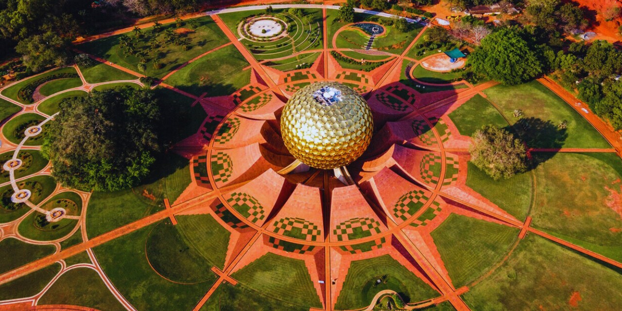 aurobindo ashram golden sculpture at garden